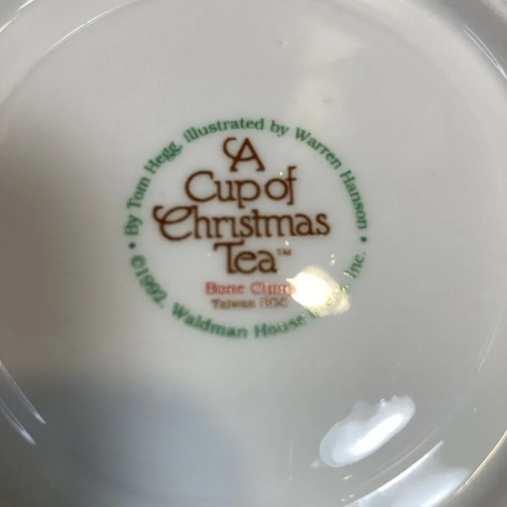 A Cup Of Christmas Tea Cup & Saucer Set Waldman House Tom Hegg Hanson Bone China